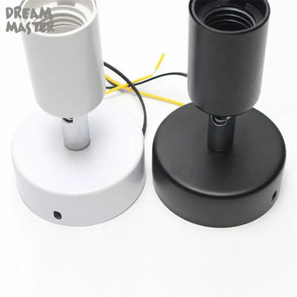 Two minimalist pendant light fixtures in matte white and black with cylindrical sockets for decorbites adjustable led track spotlight