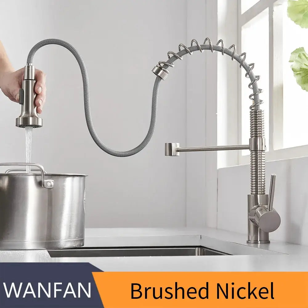 Matte black and brass kitchen faucet with pull out spring spout and brushed nickel flexible coiled hose spray head