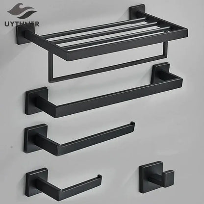 Matte black bathroom accessories set featuring a black matte metal towel rack and matching hooks for decorbites black bathroom