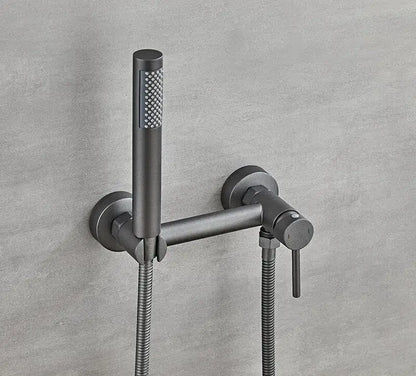 Matte black bidet faucet set with a modern matte black faucet and textured spray head for bathroom use