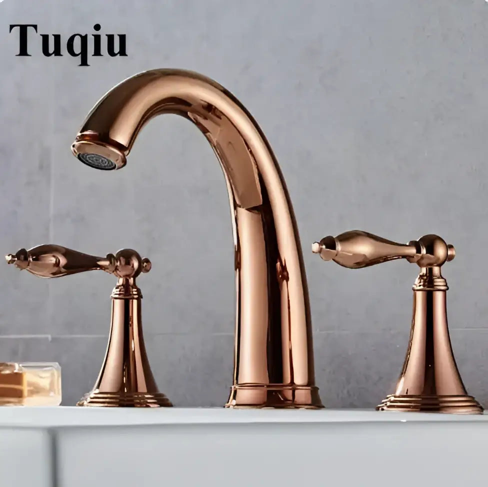 Rose gold finish three-handle bidet faucet set with curved spout and classic lever handles for bathroom use