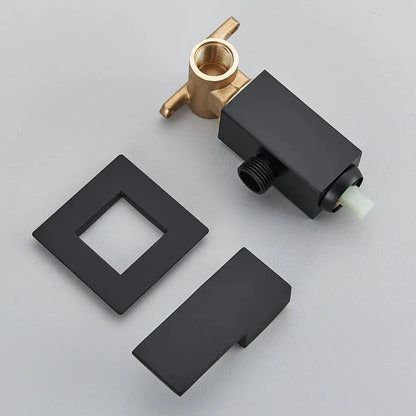 Matte black bidet faucet with handheld sprayer and brass valve featuring square components for modern bathroom use