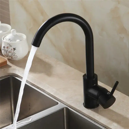 Matte black brass kitchen faucet with a curved swivel spout and single lever handle for modern kitchen setups
