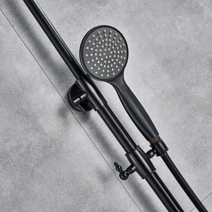 Matte black shower faucet set with bronze accents featuring a rain shower head and textured grip handle mounted on an adjustable bar