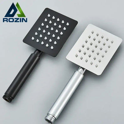 Two square stainless steel handheld shower heads in matte black and brushed silver finish for bathroom use