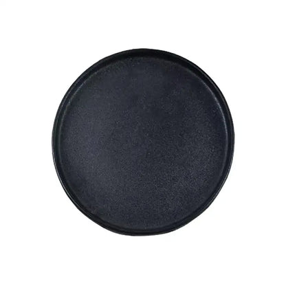 Black ceramic dinner plate with matte finish and raised rim ideal for decorbites black ceramic dining use