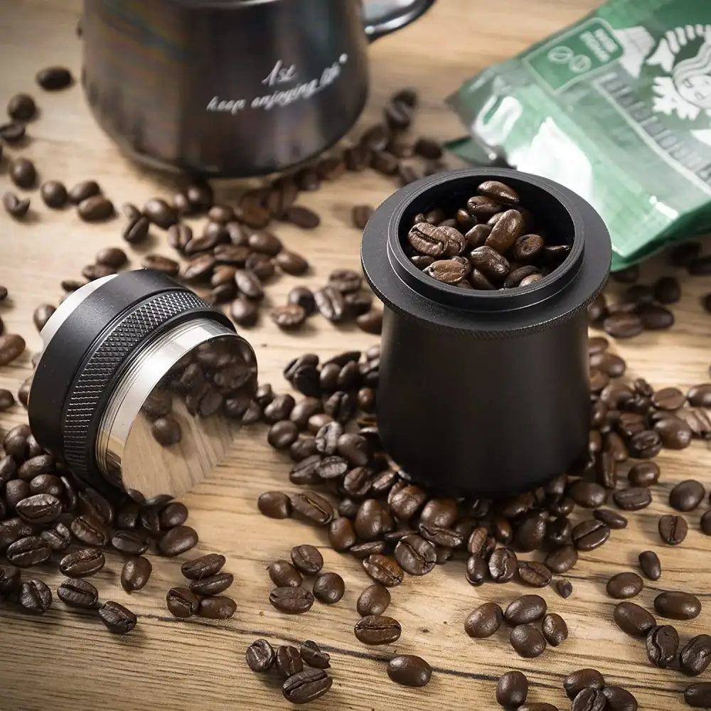Black and silver manual coffee grinder with textured grip and stainless steel blade for espresso machine dosing use