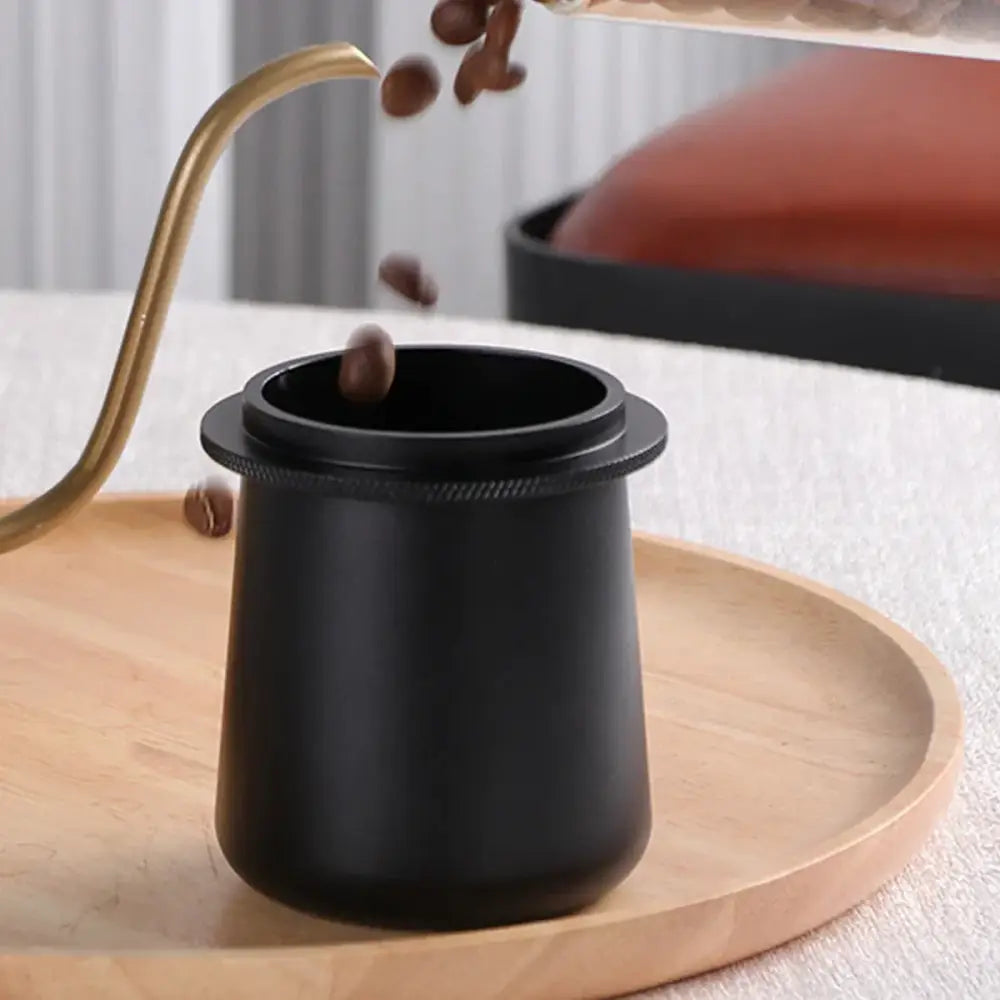 Matte black ceramic dosing cup with a textured rim for decorbites espresso machine dosing use