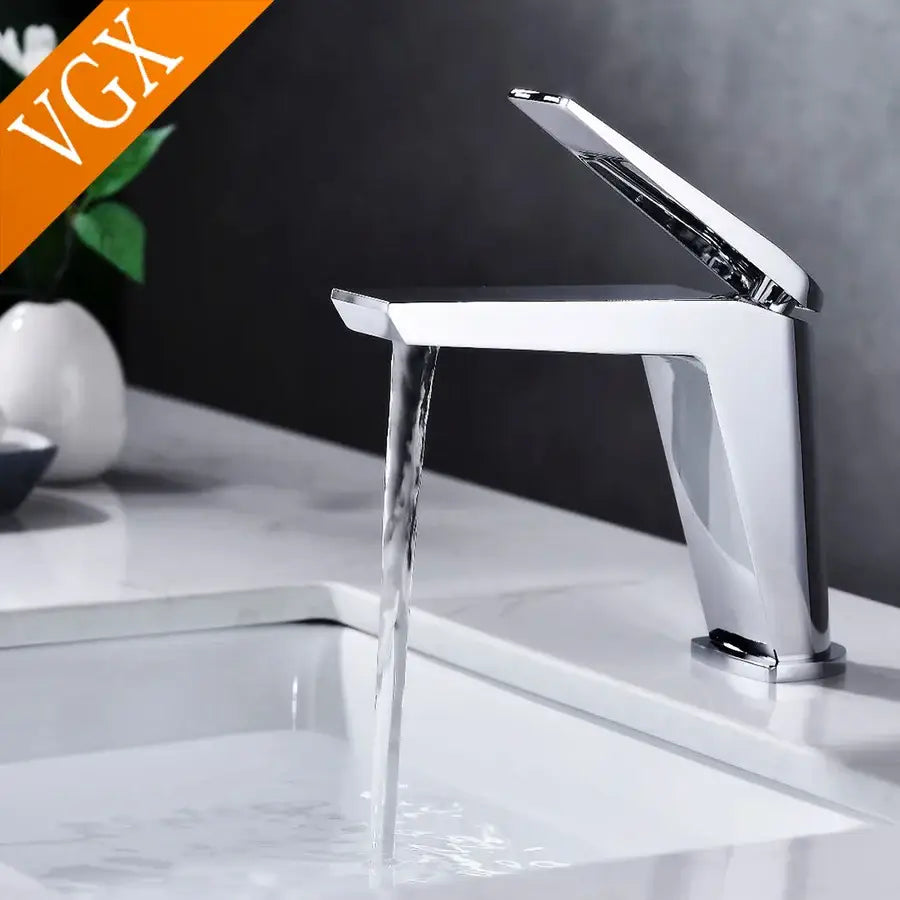 Modern chrome-finished basin mixer faucet with sleek angular contemporary square design for cold water use in bathroom