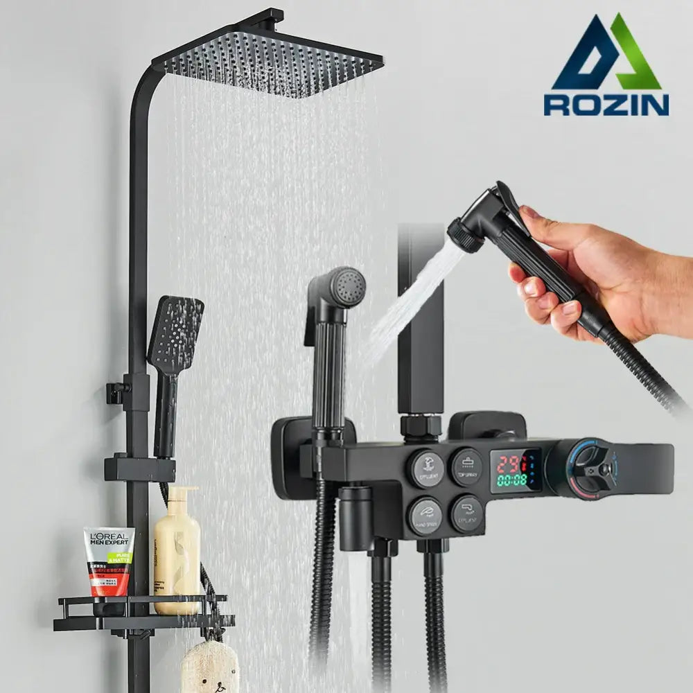 Matte black digital rainfall shower faucet set with square rainhead, handheld sprayer, and digital control panel