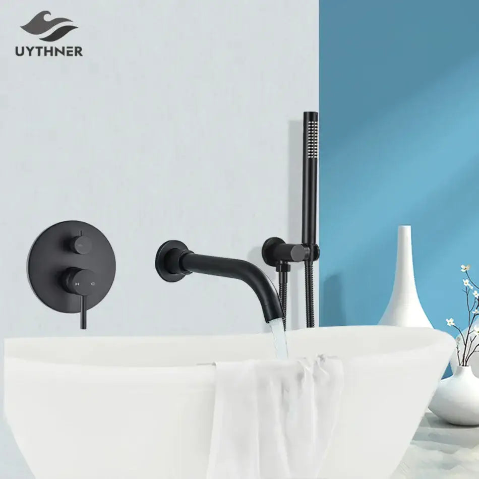 Matte black dual handle bathtub faucet set with handheld shower by decorbites in a wall-mounted matte finish