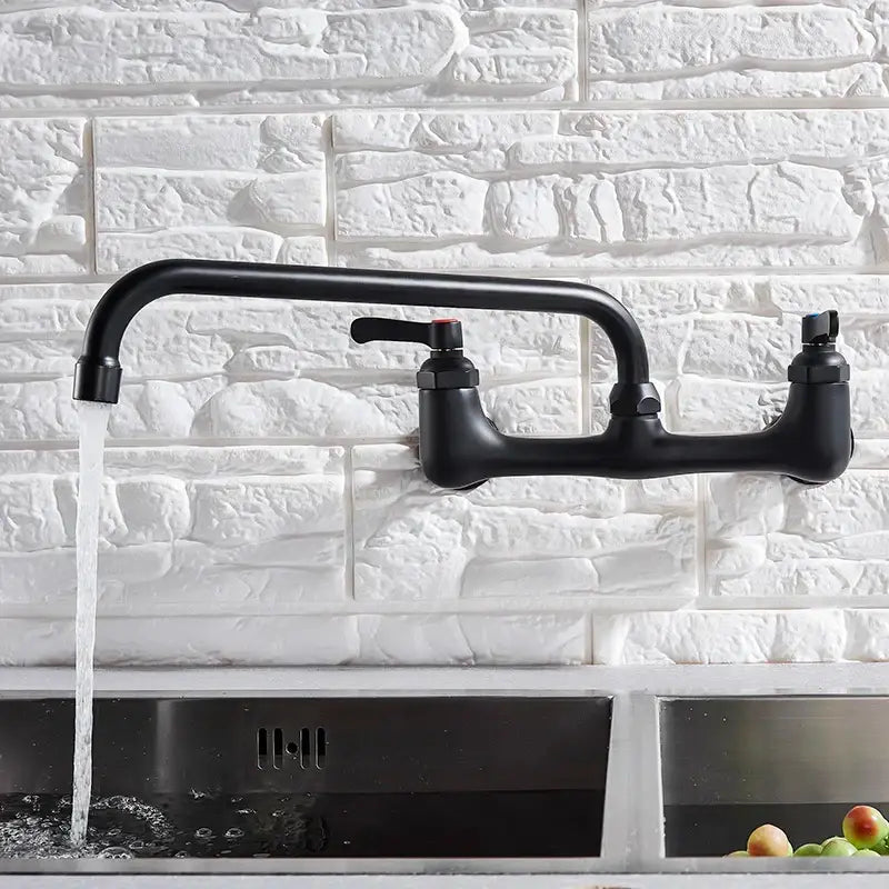 Matte black dual handle kitchen faucet with swivel hot cold water tap and curved spout on white stone backsplash