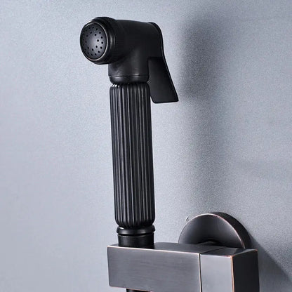 Matte black handheld bidet faucet sprayer with ribbed grip and perforated nozzle mounted on square wall bracket decorbites black bidet