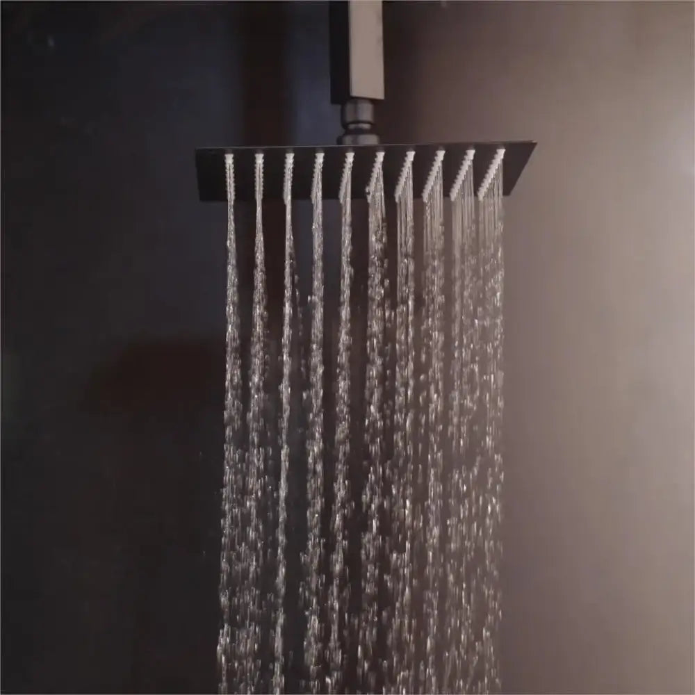 Matte black led digital shower faucet set with square rain head and multiple water streams flowing downward