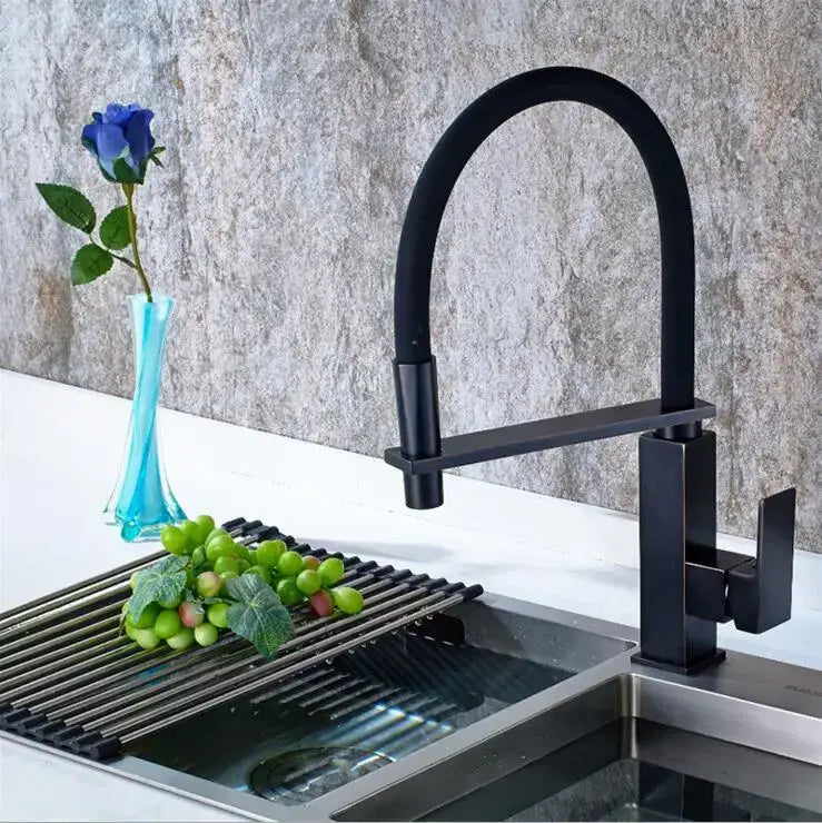 Matte black swivel kitchen faucet with pull down spray tap featuring a curved spout and rectangular handle decorbites black swivel