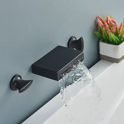 Matte black wall mounted waterfall bathroom faucet with sleek rectangular spout and dual matching handles