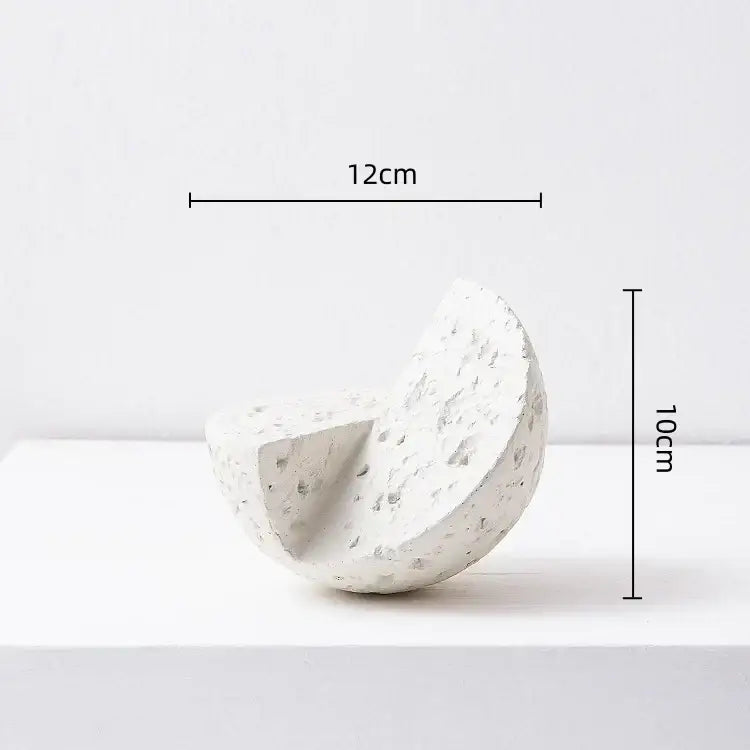 Matte blue geometric spherical home decoration accessory with white textured concrete half-sphere detail