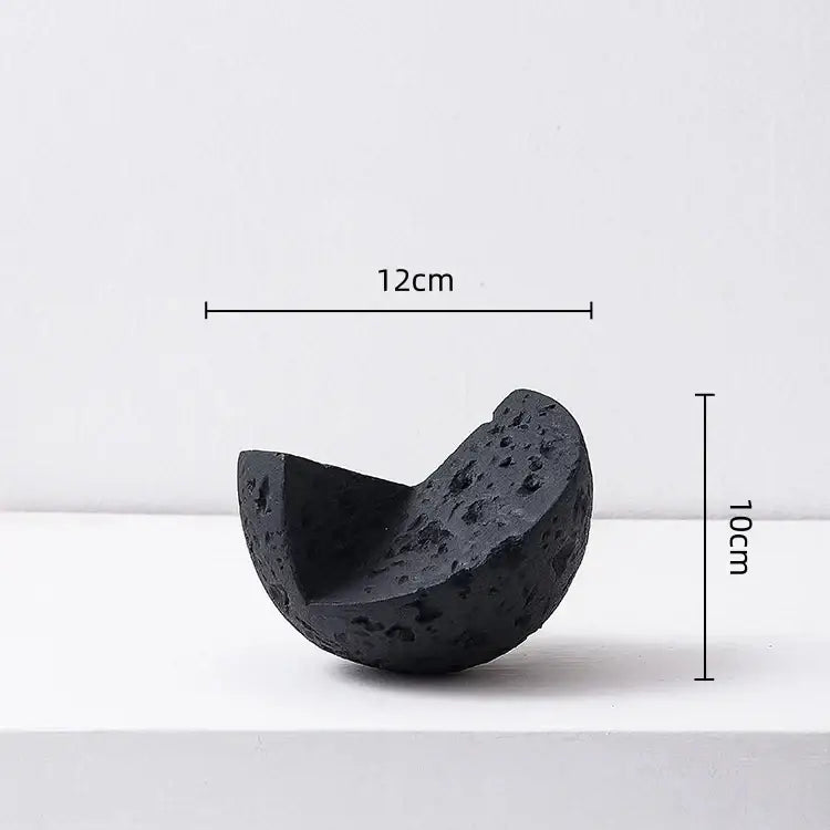 Black porous lava rock sculpture with curved half-spherical shape home decoration accessory for living room