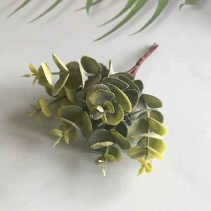 Matte gold silver and green decorbites artificial ferns shrubs with olive green and pale yellow synthetic eucalyptus foliage cluster