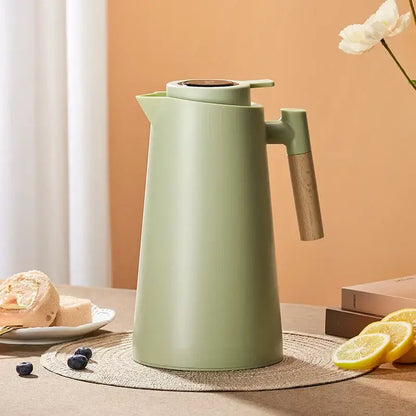 Matte sage green decorbites insulation kettle thermos bottle with mint green body wooden handle and dark brown lid