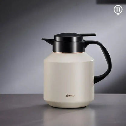 Cream-colored matte stainless steel insulation pot with black lid handle and rose gold trim by decorbites insulation pot