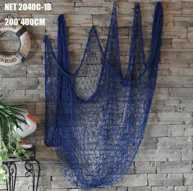Deep blue decorative fishing net wall hanging made of woven synthetic rope with textured mesh for living room decorbites decorbites decorative fishing
