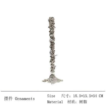 Silver resin candlestick holder with textured sculpted surface and wide base inspired by decorbites golden candlestick design