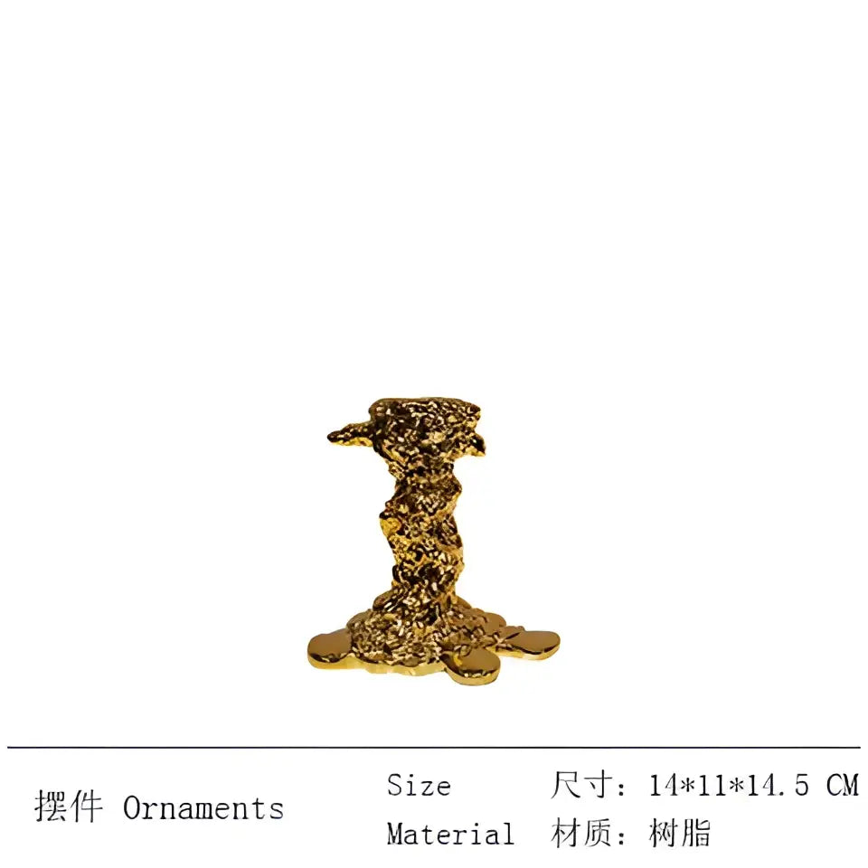 Gold-colored resin candlestick holder with textured rocky appearance and four rounded feet for dining room decorbites decor