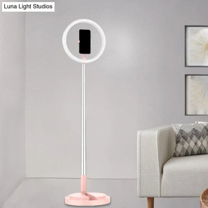 Metallic black led makeup lamp with pink and silver ring light stand and phone holder for bedroom use