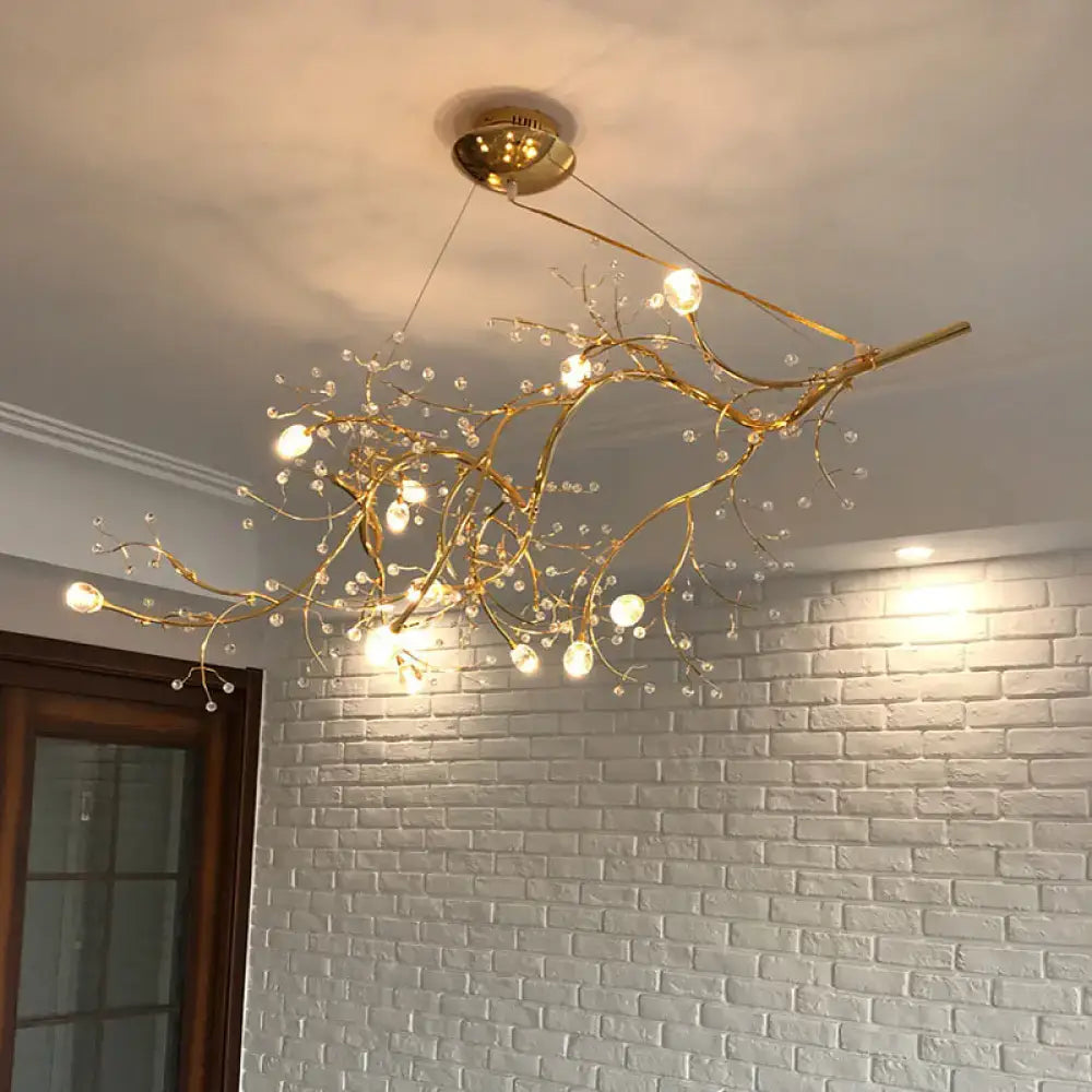Golden situla metallic thin branch chandelier with clear crystal bead droplets and warm glowing bulbs for boutique lighting