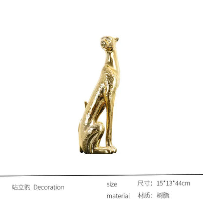 Golden resin leopard sculpture with detailed textured surface by decorbites ideal for living room decorbites leopard resin