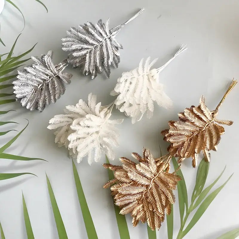 Metallic silver gold and white artificial eucalyptus leaf bunch with detailed veining for living room decor