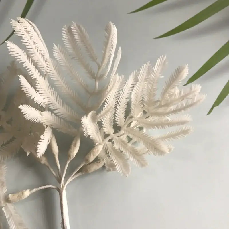 White intricately detailed artificial eucalyptus fern with delicate fronds in metallic silver gold and white eucalyptus leaf bunch 6-pack