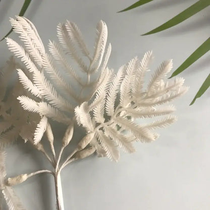 White intricately detailed artificial eucalyptus fern with delicate fronds in metallic silver gold and white eucalyptus leaf bunch 6-pack
