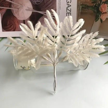Metallic silver gold and white artificial eucalyptus leaf bunch six-pack featuring white plastic fern-style eucalyptus branches