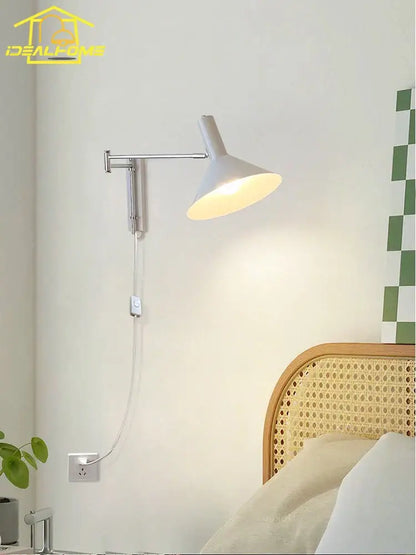 White adjustable wall lamp with sleek metallic arm and conical shade for decorbites cream wind bedroom reading light