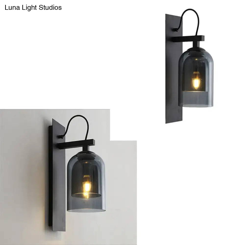 Mid-century black metal wall sconce with smoked dome glass shade 8 inches wide for living room lighting