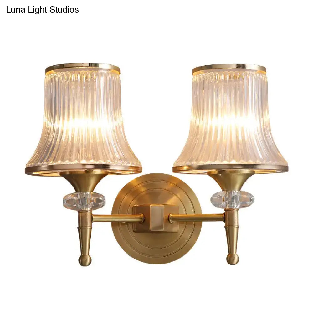 Mid-century brass crystal ribbed wall mounted lamp with two fluted translucent glass shades for living room use