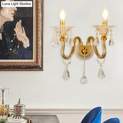 Mid-century brass crystal shade wall mounted sconce with gold-toned finish and clear glass teardrop accents for bedroom lights wall