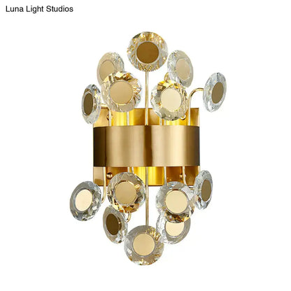 Mid century gold wall light with integrated led and crystal disc accents for living room illumination