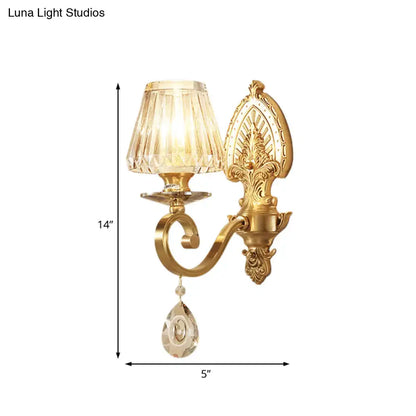 Mid century gold crystal wall sconce with faceted crystal shade and teardrop pendant compatible with led incandescent light types