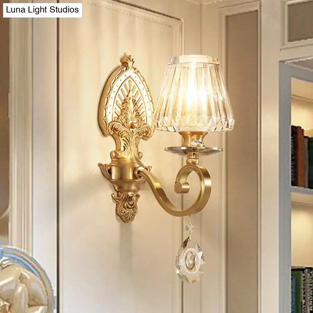 Mid century gold crystal wall sconce with faceted lampshade and crystal droplet compatible with led incandescent light type