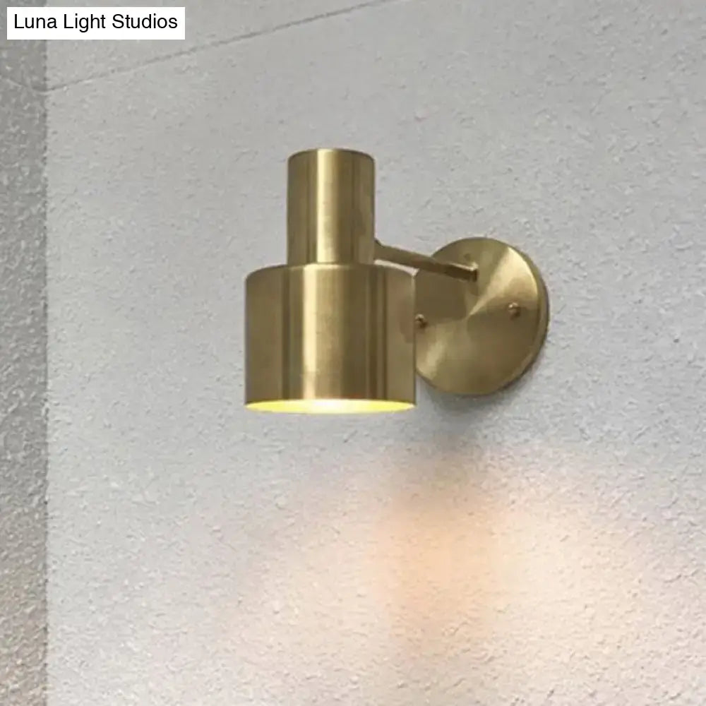 Brass-finished mid-century gold metal cage wall lighting with adjustable cylindrical spotlight for home wall lighting