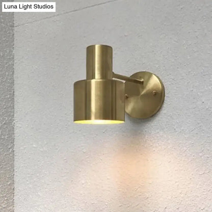 Brass-finished mid-century gold metal cage wall lighting with adjustable cylindrical spotlight for home wall lighting