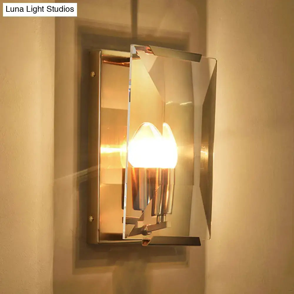 Mid century wall sconce with brushed brass frame crystal shield and warm bulb base for living room lighting