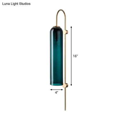Mid century gooseneck wall light with polished brass hardware and deep teal cylindrical glass shade for bedroom use
