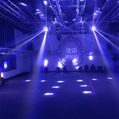 Blue stage lighting rig with multiple spotlights and red green laser light beams illuminating a circular backdrop in nightclub party room