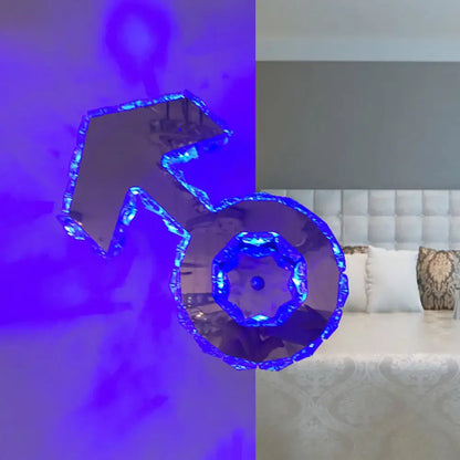 Minimal chrome faceted crystal boy logo bedroom wall lighting with a translucent blue crystal tractor sculpture and illuminated center