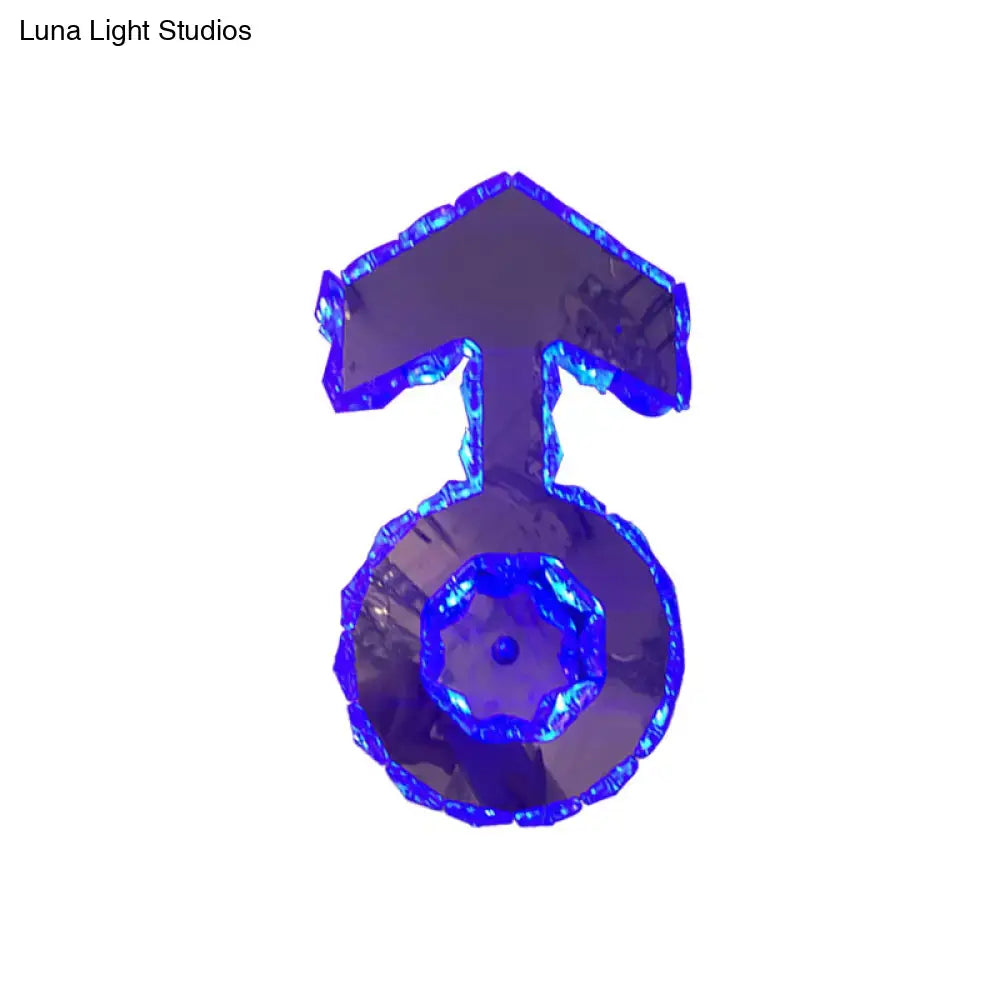 Minimal chrome faceted crystal boy logo wall lighting with a translucent blue crystal pendant featuring a hexagonal cutout