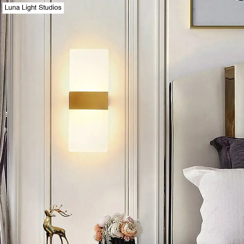 Modern minimalist acrylic wall sconce with frosted glass panel and polished gold accent for bedroom wall lamp